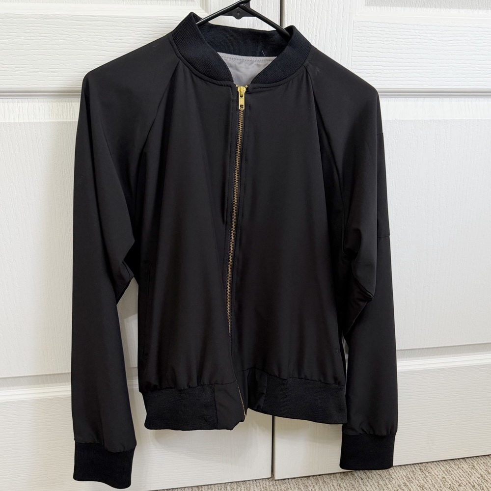 Elegant Black Bomber Jacket with Gold Zipper Detail for Women